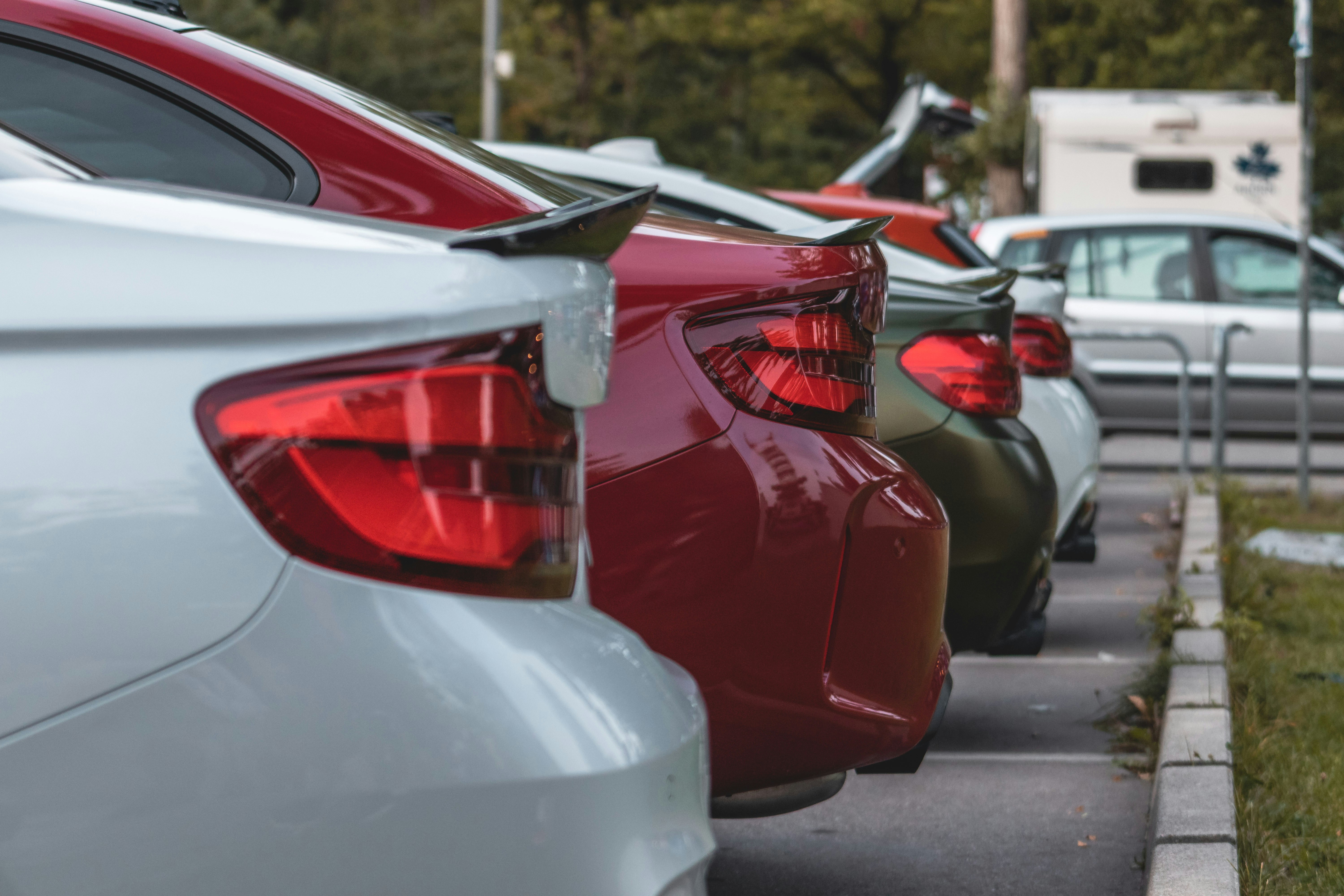 Row of parked cars showing different vehicle types